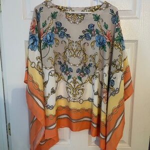 Kim Gravel Poncho blouse.